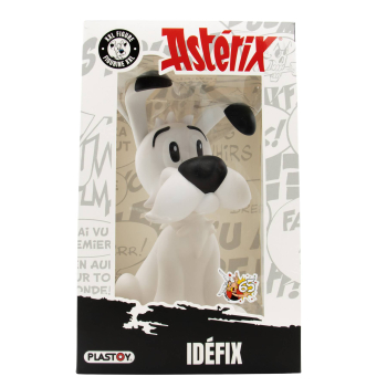 Weiße Idefix-Figur aus Asterix in einer Verpackung mit Comic-Design. Der kleine Hund sitzt und blickt nach vorn.